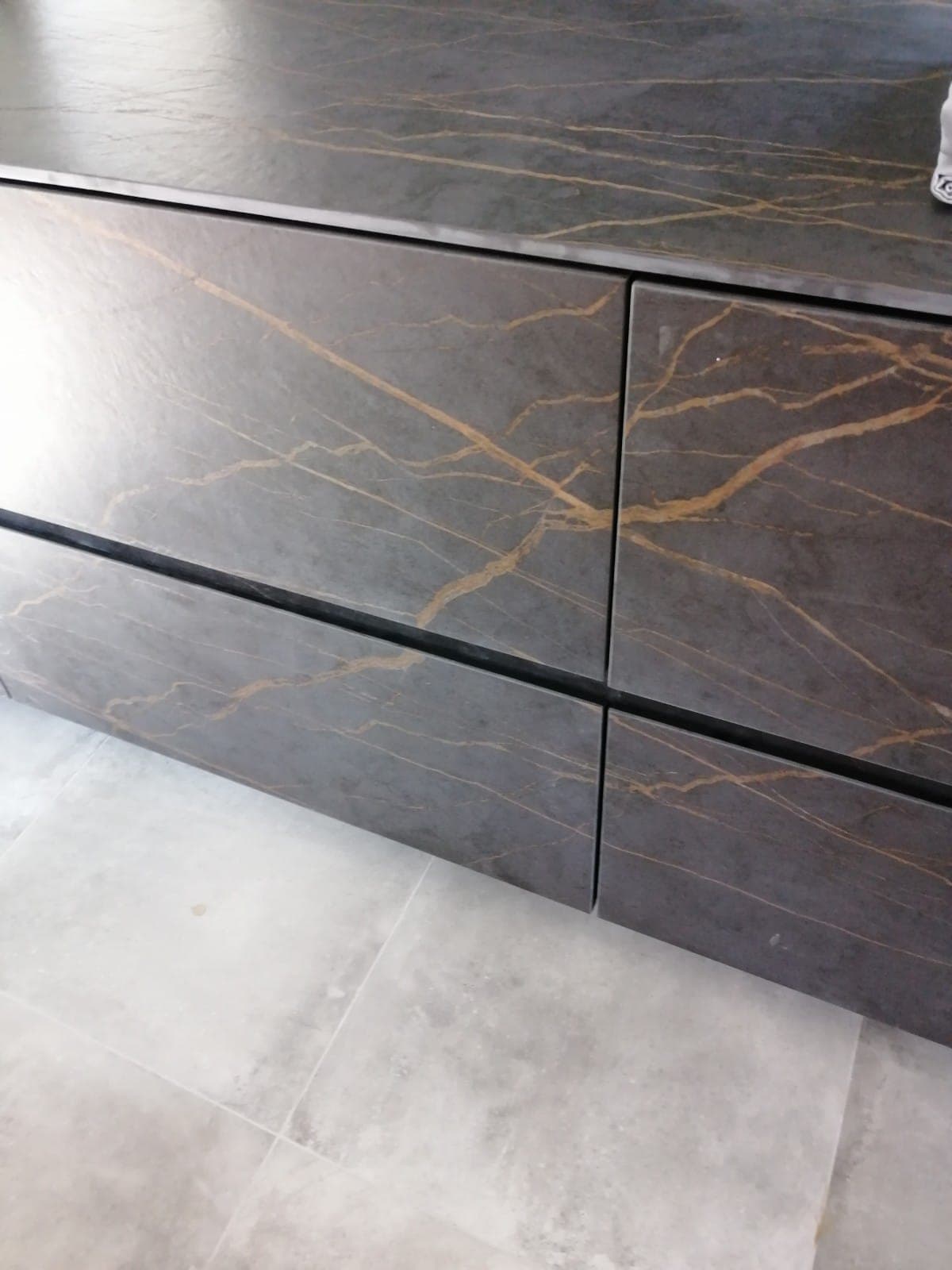 Detail of the dark fronts with wood grain