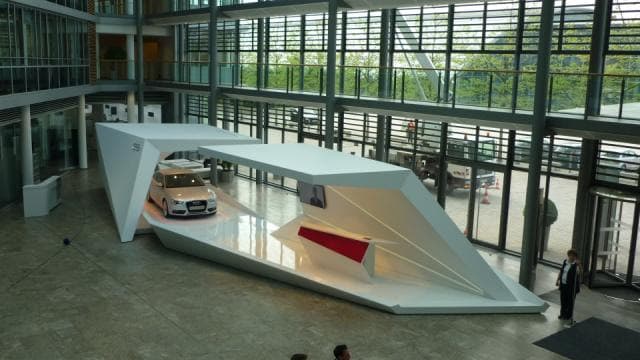 Sculptural presentation stand with a vehicle for AUDI by Lauer-Seele